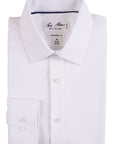 Folded white dress shirt with 'Bill Blass' label on a white background