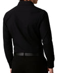 Black dress shirt worn by a person on a white background