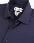 Navy shirt with a brand label on a white background