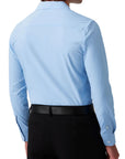 Light blue dress shirt worn by a person on a white background