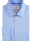 Blue checkered dress shirt with 'Bill Blass' label on a white background
