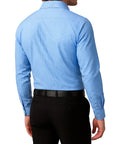 Person wearing a blue checkered shirt and black pants on a white background