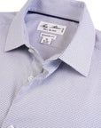Close-up of a blue checkered dress shirt with 'Bill Blass' label on a light gray background