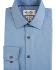 Folded blue checkered dress shirt with a brand label on a white background
