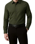 Green dress shirt worn by a person on a white background