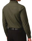 Green shirt worn by a person on a white background