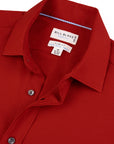 Red shirt with a Bill Blass label on a white background