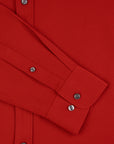 Close-up of a red shirt with buttons and collar details