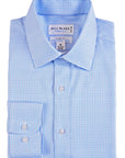 Folded blue checkered shirt with 'Bill Blass' label on a light gray background