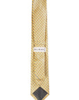 Yellow patterned tie with 'Bill Blass' label on a white background
