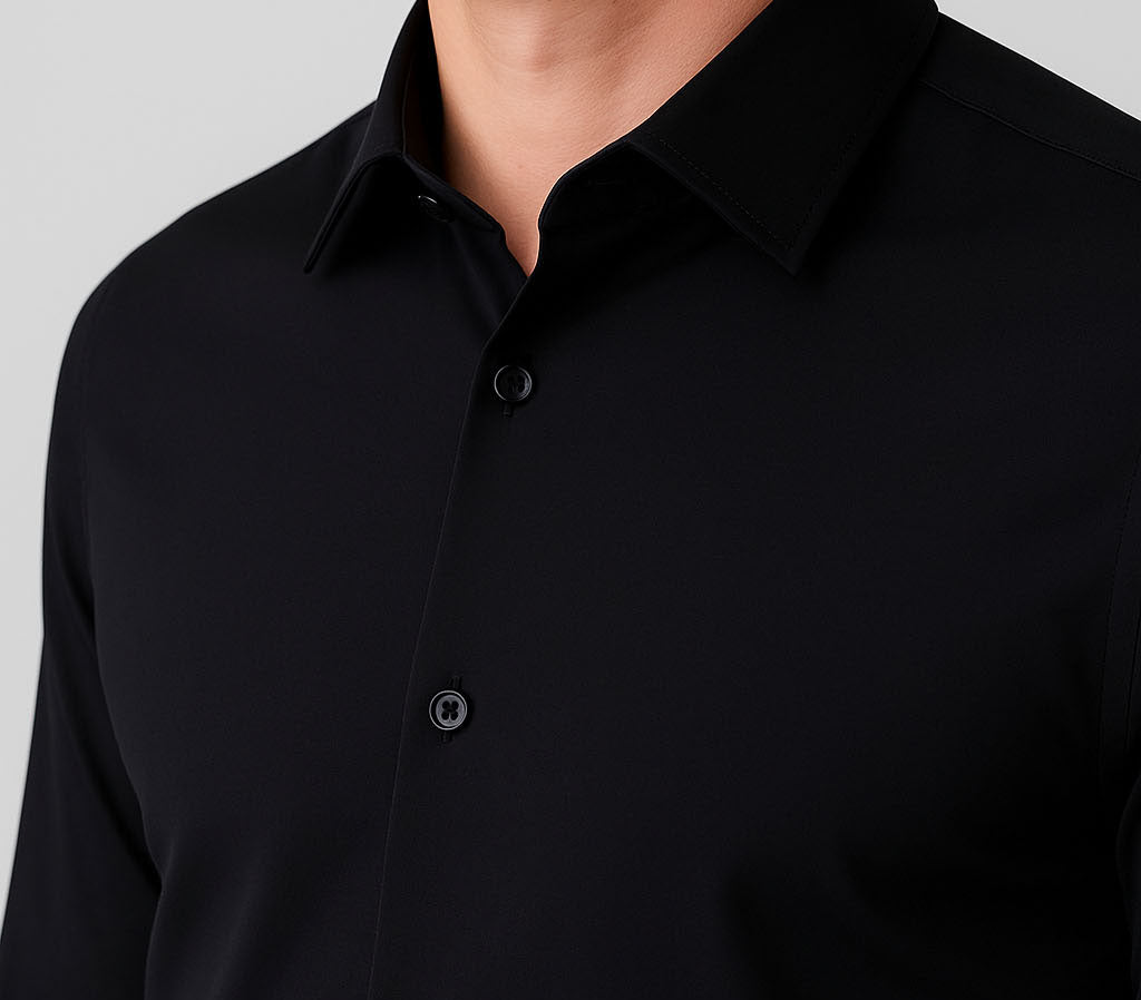 Close-up of a black button-up shirt on a gray background