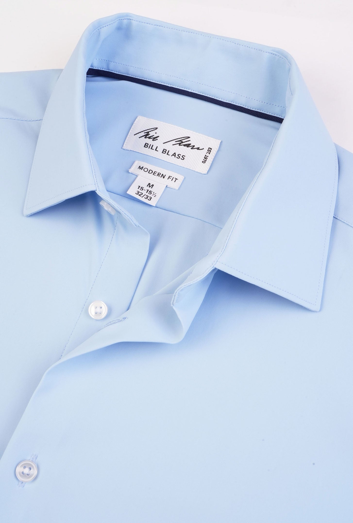 Light blue dress shirt with a brand label on a white background