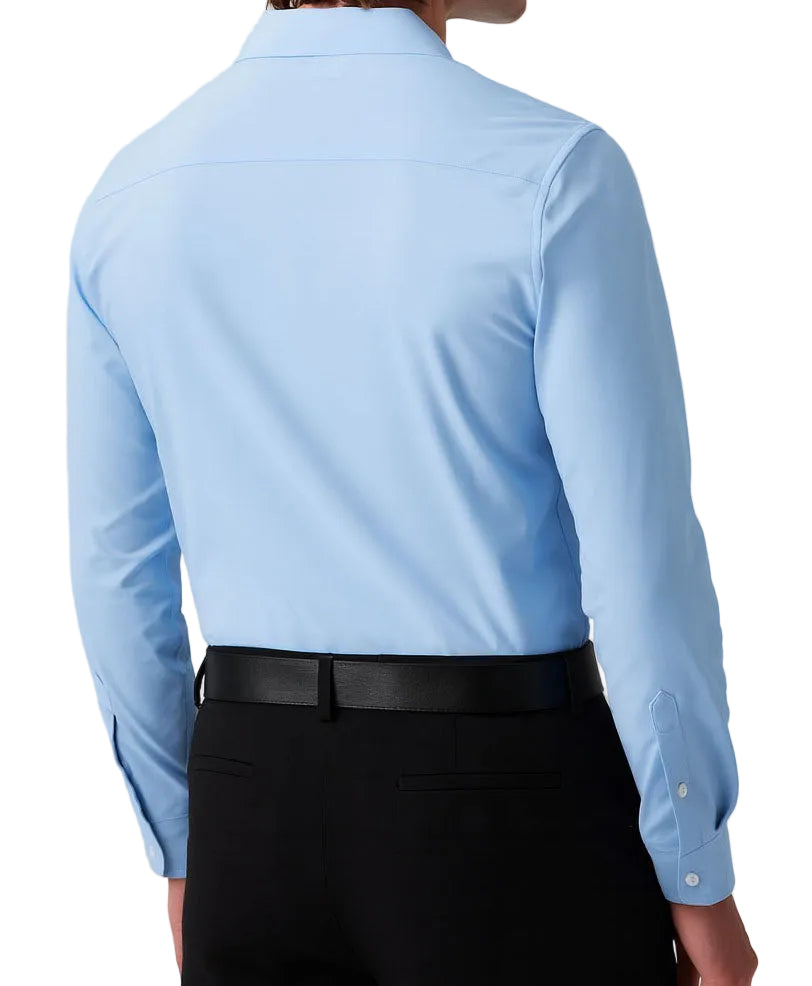 Light blue dress shirt worn by a person on a white background