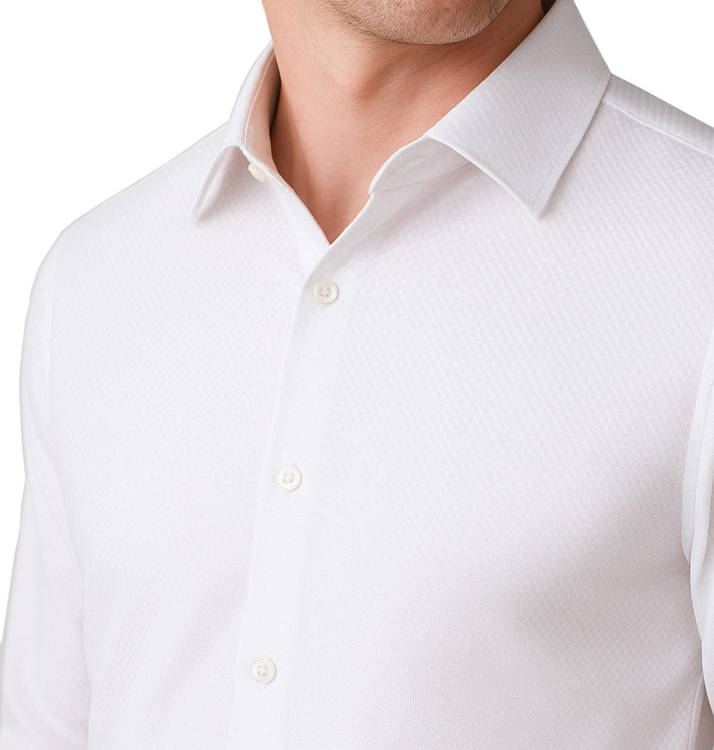 Close-up of a white dress shirt with a collar on a white background