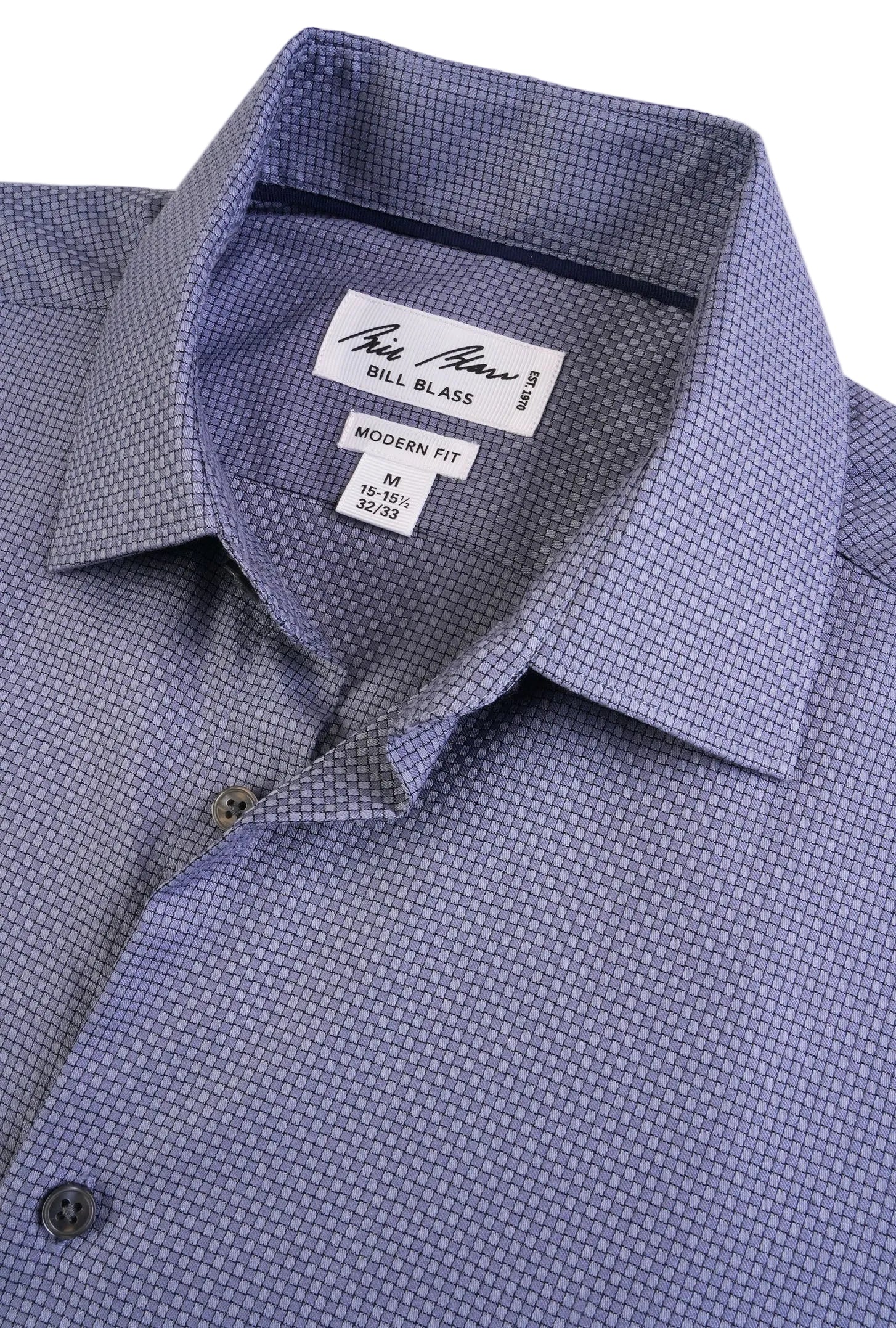 Close-up of a blue checkered dress shirt with a brand label on a white background
