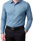 Man wearing a blue checkered shirt and black pants on a white background