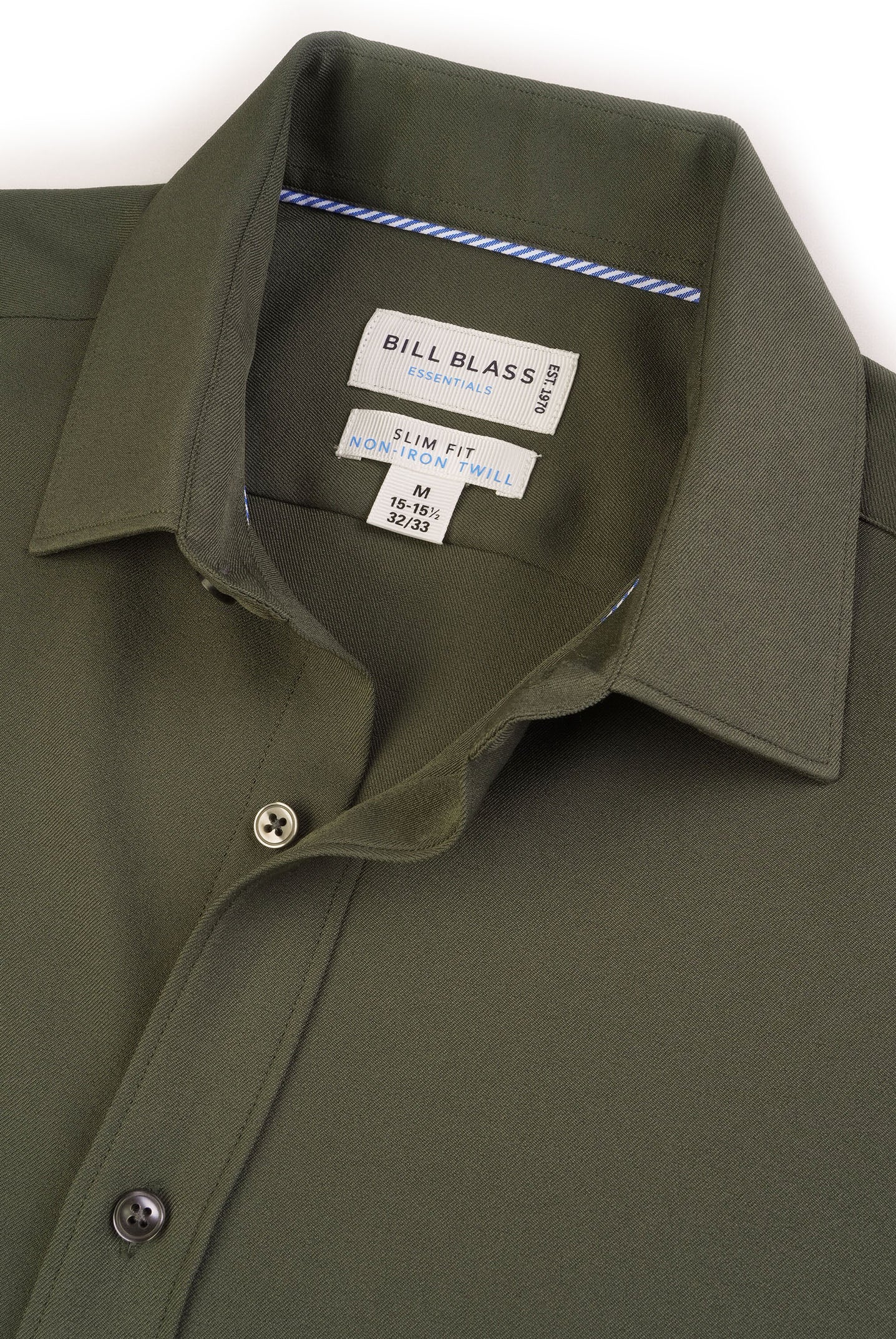 Green shirt with Bill Blass label on a white background