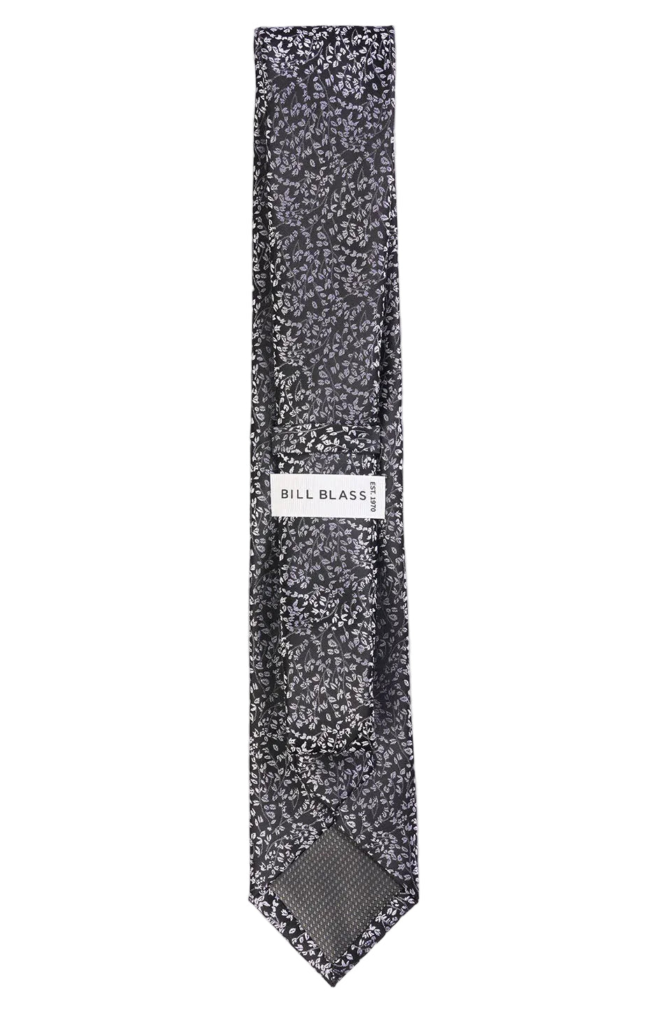 Floral patterned tie with 'Bill Blass' label on a white background