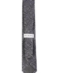Floral patterned tie with 'Bill Blass' label on a white background